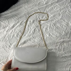 Elegant White Clutch with Gold Chain